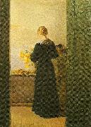 Anna Ancher en ung pige ordner blomster oil painting artist